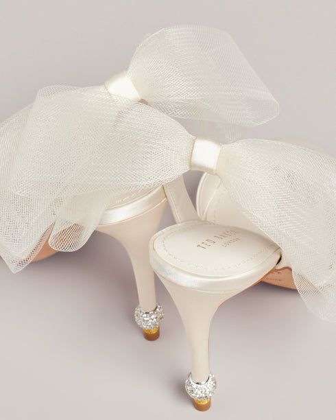 HARINAA-Sandals-Pay attention to the details with HARINAA. These satin sandals are crowned wth a double mesh organza bow at the back and crystal embellishment on the stiletto heels for dazzling elegance. Heeled sandals Oversized mesh ankle bow Satin finish Open toe Slim toe strap Crystal embellished heel detail Slingback design- Ted Baker Romania